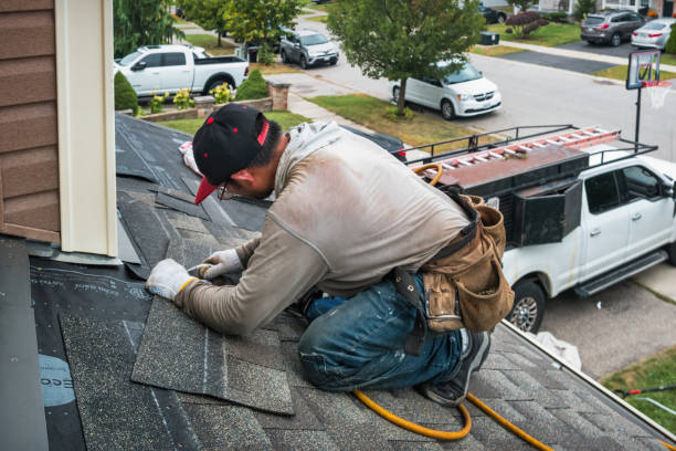 Professional Roof Replacement technician working in Mendon, MA